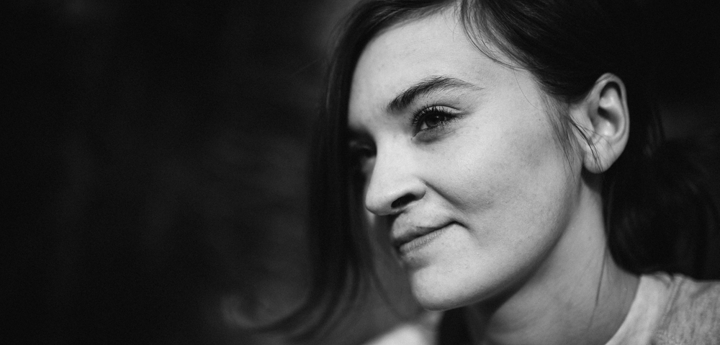 Black and white photo of a young girl in her mid 20's who had cleft lip.